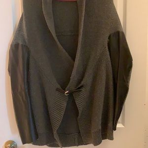 Grey sweater with faux black leather sleeves